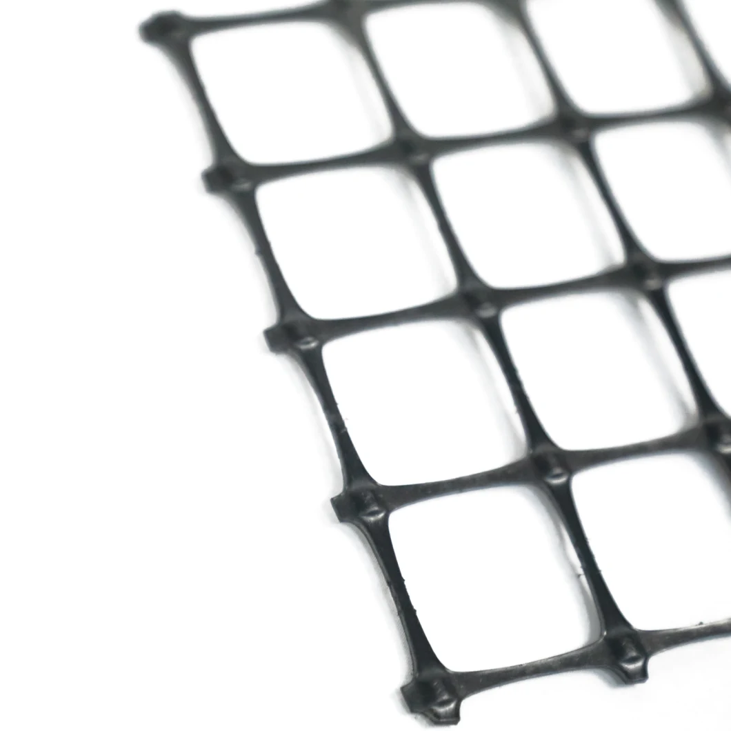 La cuesta del suelo de la fábrica ISO empareda rejilla negra de la grava de Geogrid 50-50kn del poliéster de alta resistencia del refuerzo