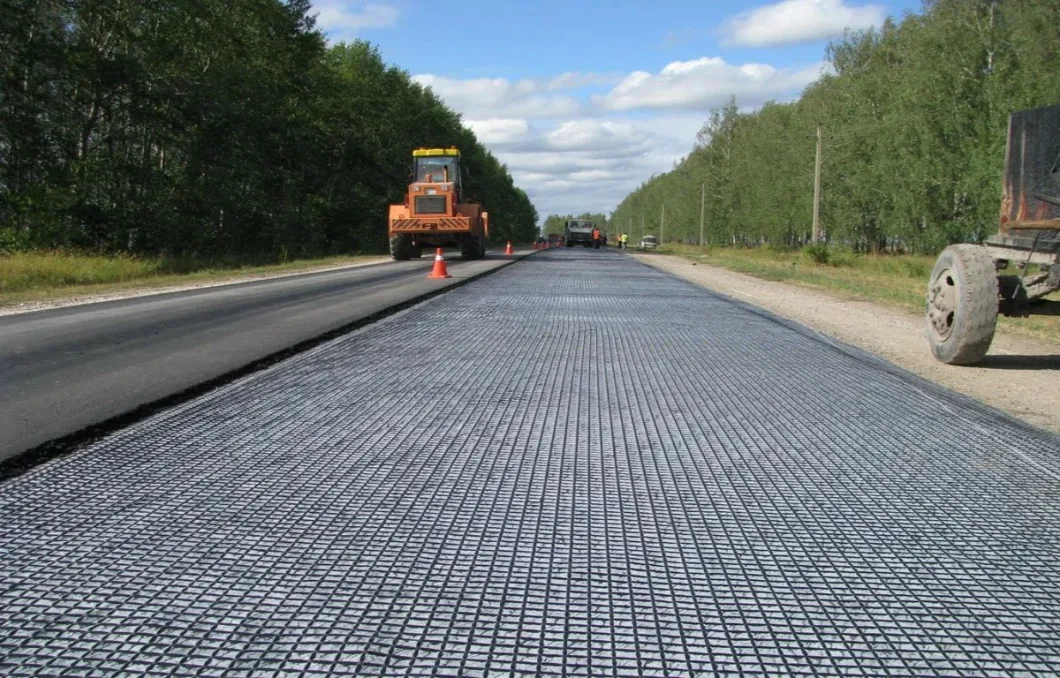 Geogrid de fibra de vidrio biaxial compuesta con geotextil no tejido para refuerzo del suelo/material de construcción vial Geocompos 9