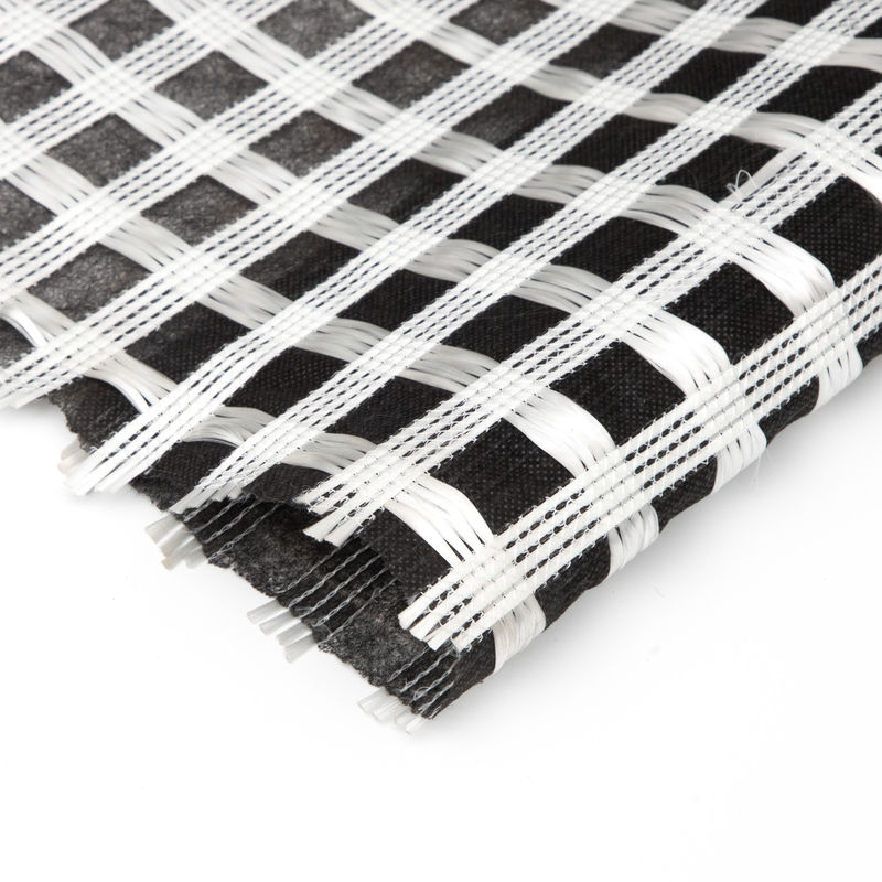 Geogrid de fibra de vidrio biaxial compuesta con geotextil no tejido para refuerzo del suelo/material de construcción vial Geocompos