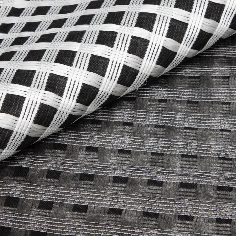 Geogrid de fibra de vidrio biaxial compuesta con geotextil no tejido para refuerzo del suelo/material de construcción vial Geocompos