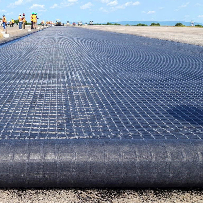 Geogrid de fibra de vidrio biaxial compuesta con geotextil no tejido para refuerzo del suelo/material de construcción vial Geocompos