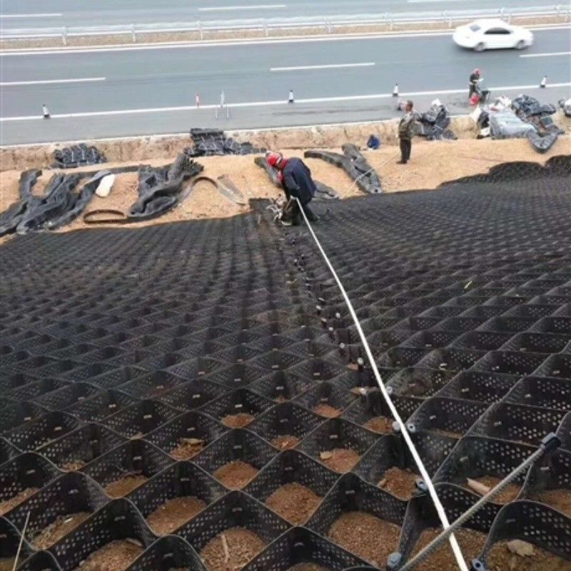 Carretera de acoplamiento de geocell de acoplamiento negro HDPE para carreteras estabilizador de grava pared de apoyo