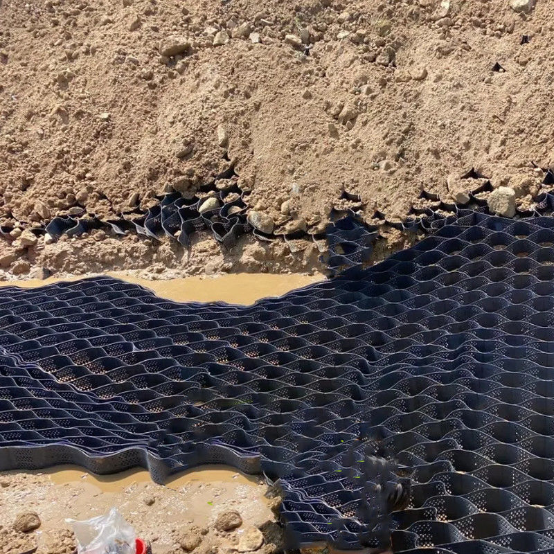 Sistema de confinamiento celular texturizado con agujeros de alto nivel panal de miel HDPE Geocell para la carretera Fundación Protección de pendientes Parking Parque de estacionamiento entrada Pared de contención