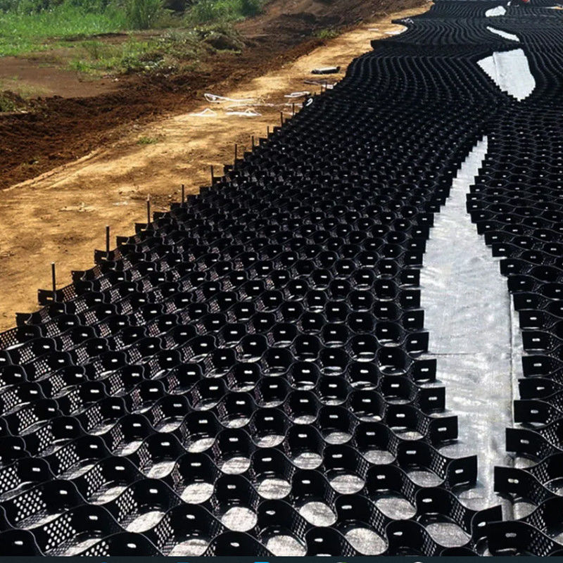 Sistema de confinamiento celular texturizado con agujeros de alto nivel panal de miel HDPE Geocell para la carretera Fundación Protección de pendientes Parking Parque de estacionamiento entrada Pared de contención