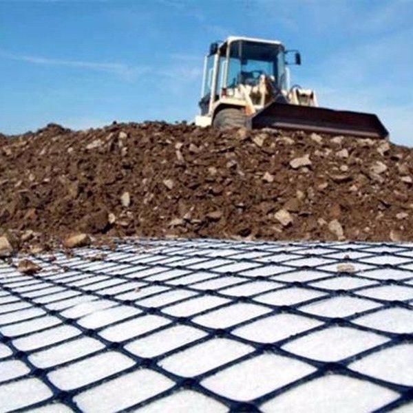 Alta resistencia a la tracción malla de plástico biaxial 30kN/m Negro PP/PET Geogrid para el refuerzo del suelo y la estabilización de la base de la carretera