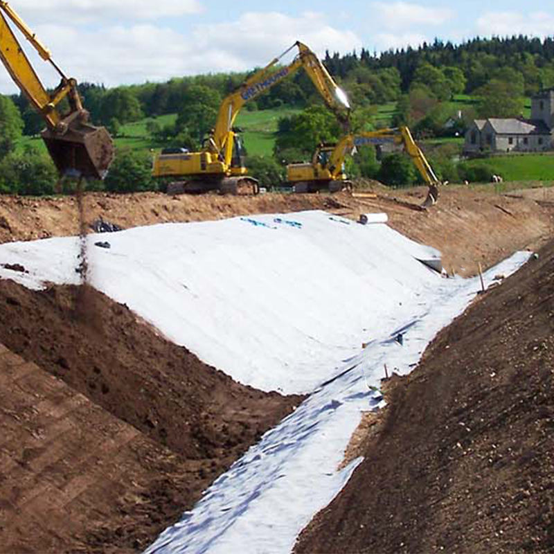 Geotextil de tela no tejida spunbond Pet/PP para embalses, lagos artificiales, balsas de relaves, vertederos, filtración, aislamiento