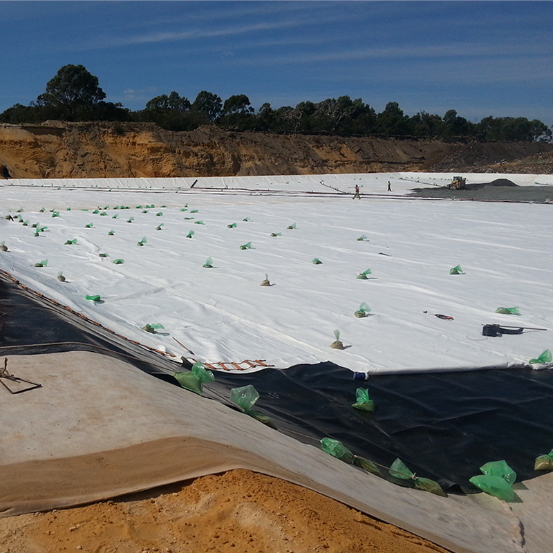 Geotextil de tela no tejida spunbond Pet/PP para embalses, lagos artificiales, balsas de relaves, vertederos, filtración, aislamiento