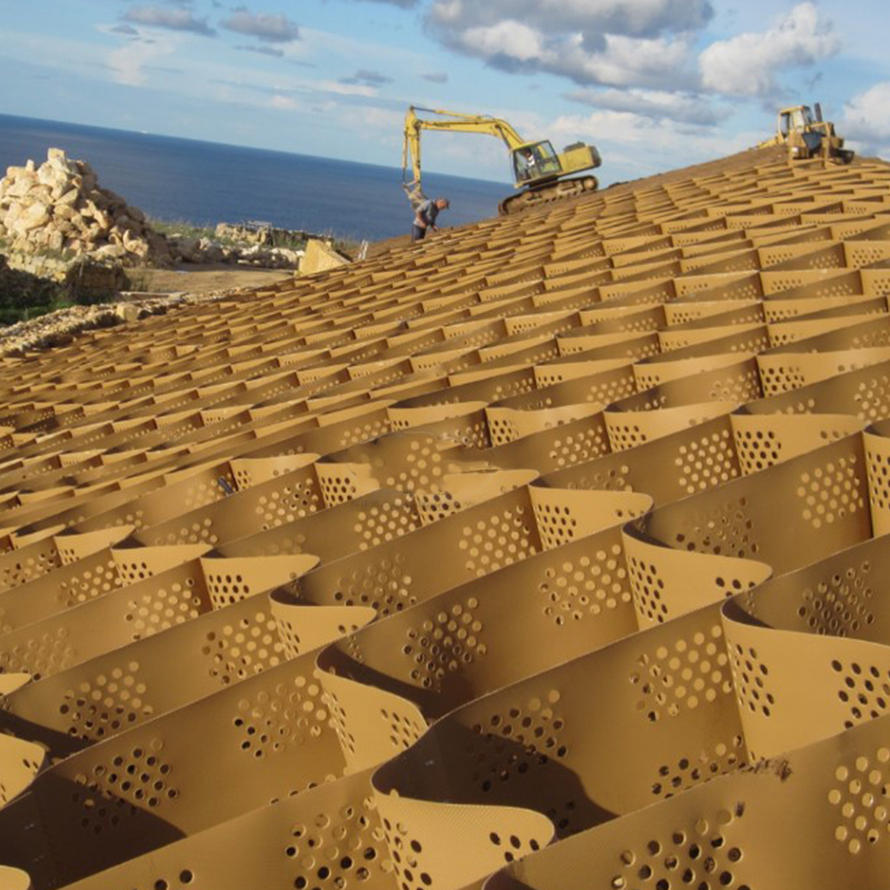 Geocelda de plástico de HDPE texturizado y perforado para estabilización de grava en entradas de vehículos, refuerzo de base de carretera, estacionamientos y protección de taludes