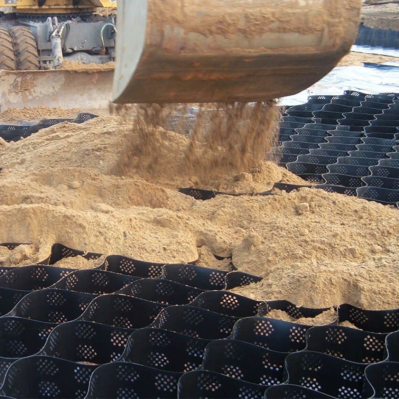 Geocelda de plástico de HDPE texturizado y perforado para estabilización de grava en entradas de vehículos, refuerzo de base de carretera, estacionamientos y protección de taludes
