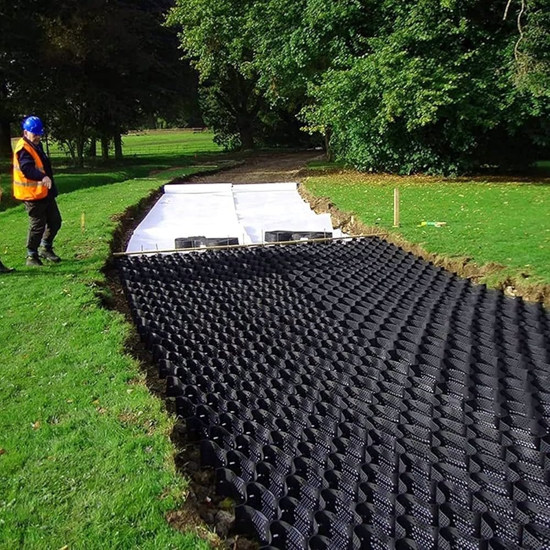 Geoceldas de HDPE duraderas Geocelda de HDPE de superficie lisa para entradas de vehículos Control de erosión para taludes Soporte de muro de contención